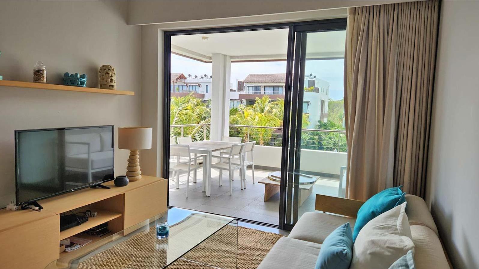 Appartement Le Dauphin Du Lagon Bleu - Plages De Mont Choisy Et De Trou Aux Biches Гранд-Бэй Экстерьер фото